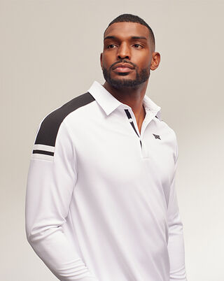 Man wearing long sleeve knit shoulder panel polo